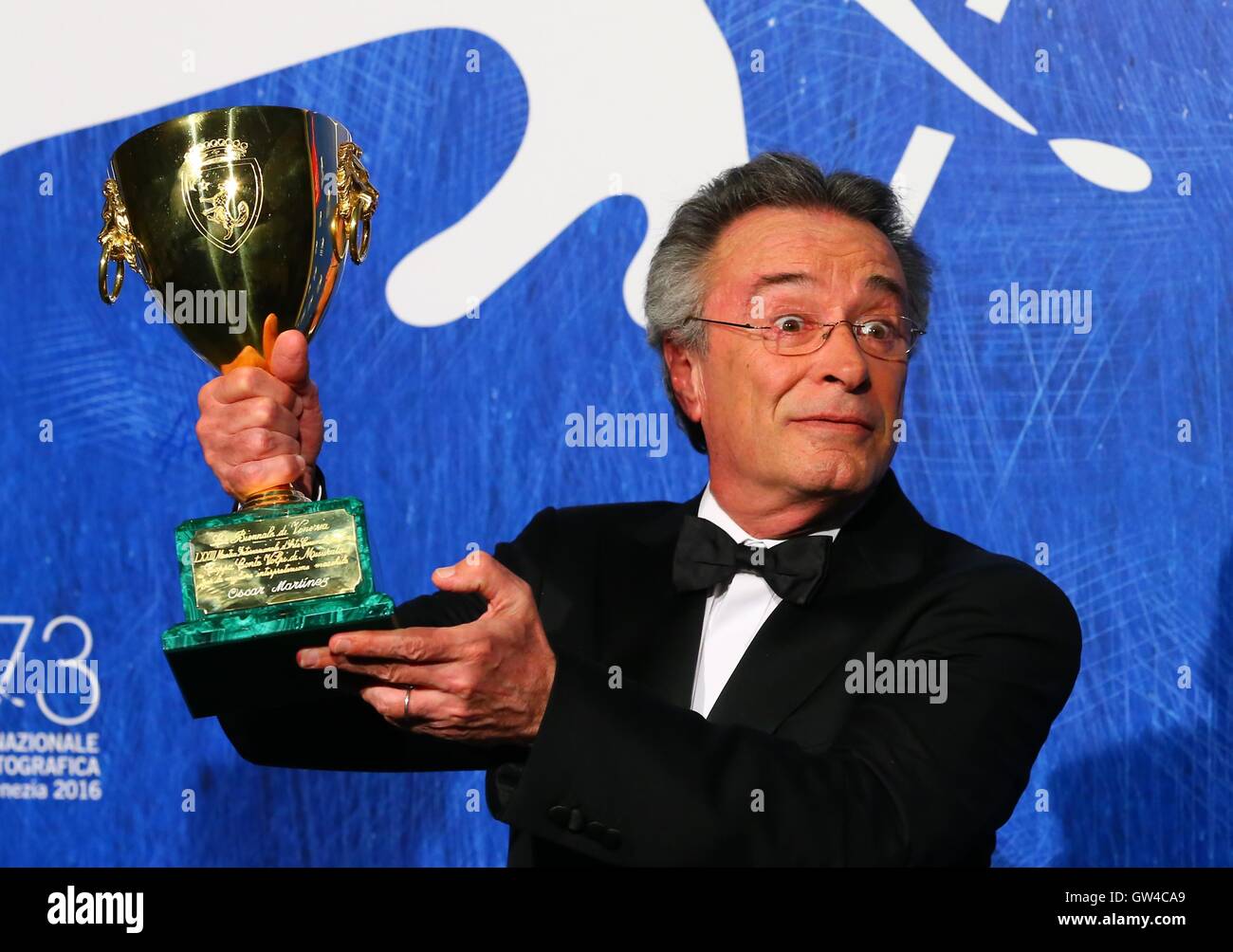 Venice, Italy. 10th Sep, 2016. Actor Oscar Martinez poses with Coppa Volpi for Best Actor for 'El Ciudadano Ilustre' (The Distinguished Citizen) during the award winners photocall of the 73rd Venice Film Festival in Venice, Italy, on Sept. 10, 2016. Credit:  Gong Bing/Xinhua/Alamy Live News Stock Photo