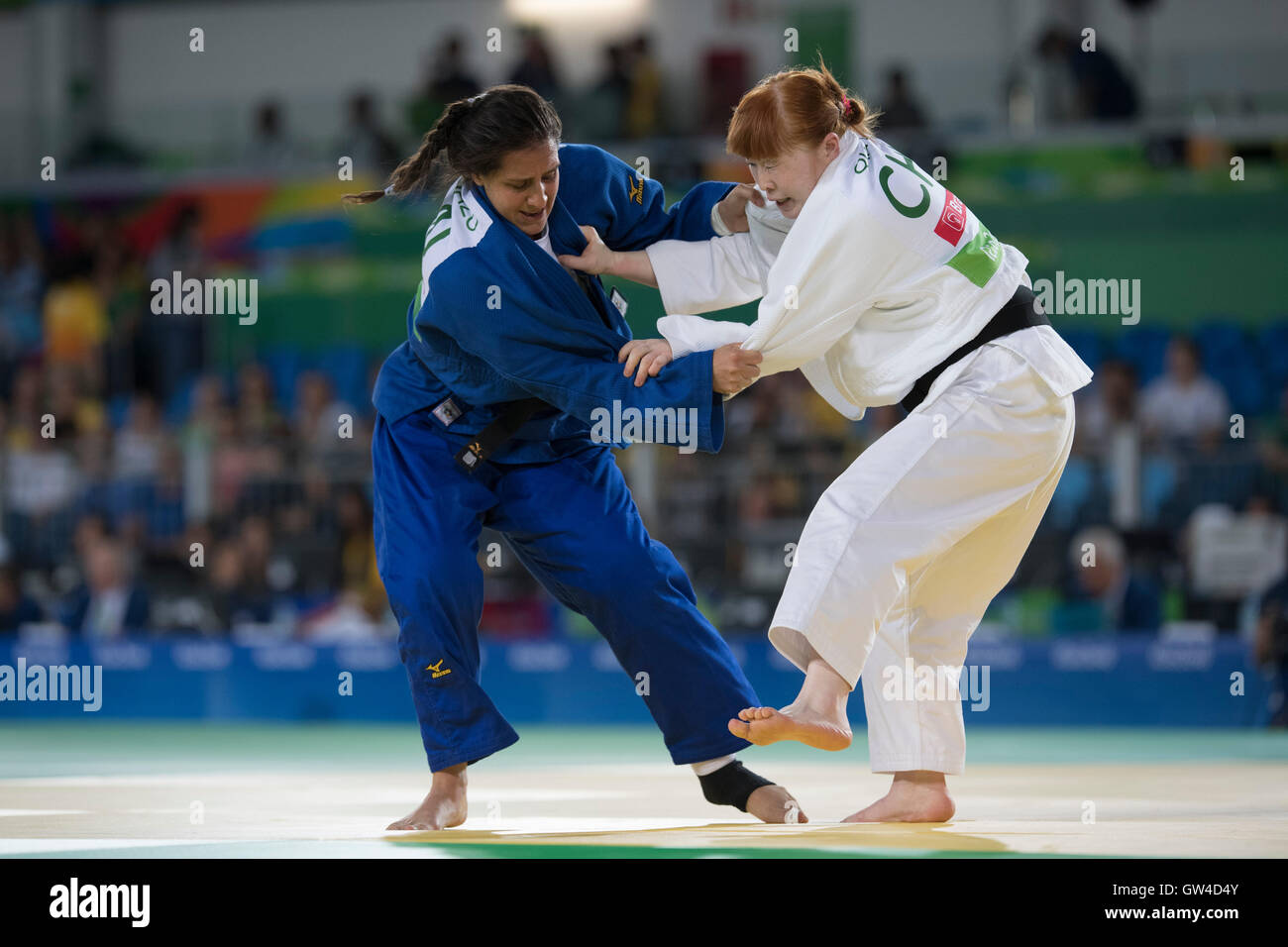 Venezuela's Naomi Soaza (blue) vs. China's Zhou Quin in the women's under-70 kg judo at the 2016 Rio Paralympic Games Stock Photo