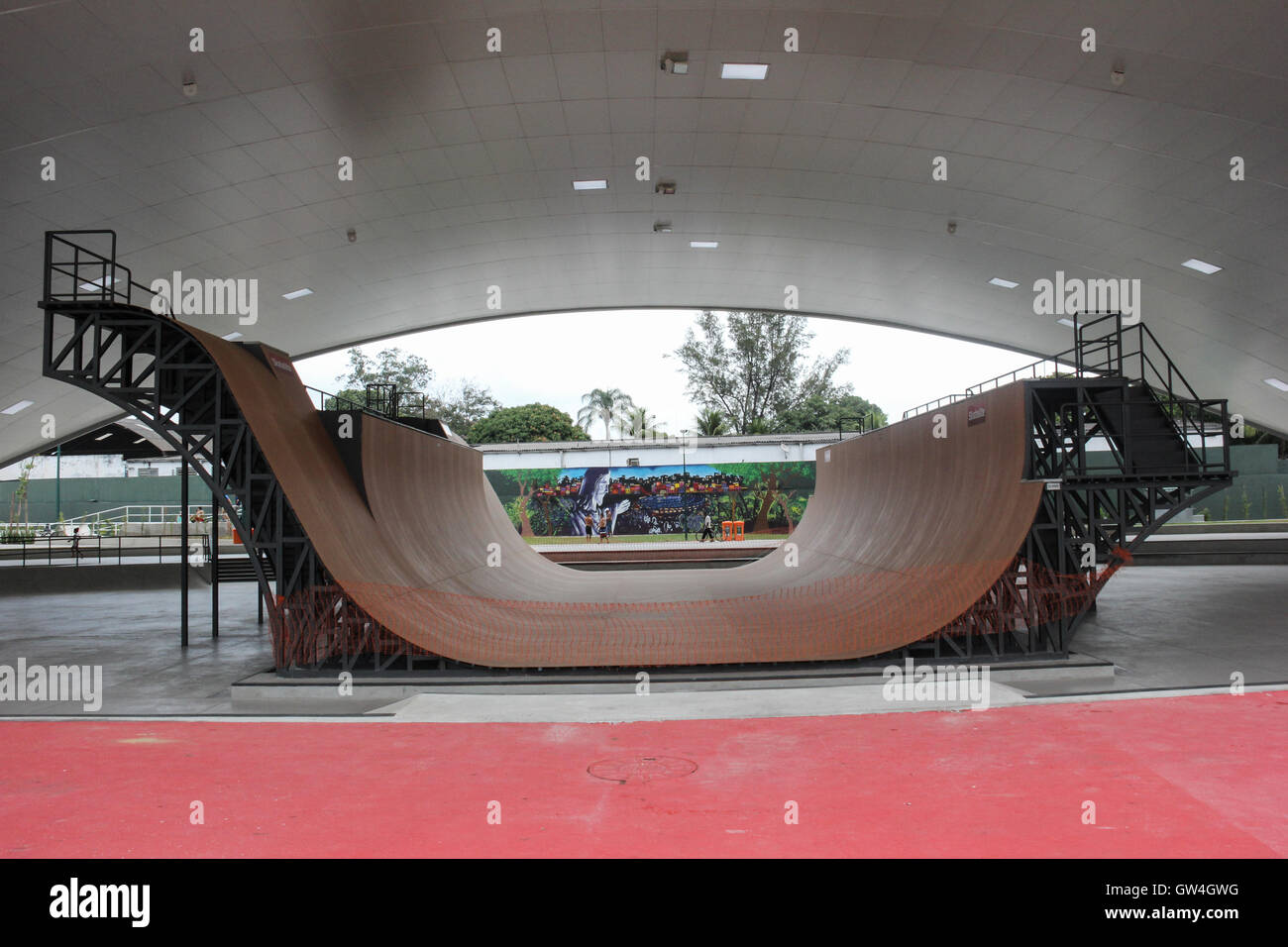 Rio de Janeiro, Brazil, 10 September, 2016: Madureira Park holds the world’s largest public half pipe skate park, designed by X Games World Champion Bob Burnquist, the Brazilian skater with the largest winning record in the sport. The half pipe structure is made of metal and special wood. Its dimensions are impressive: 18.7 meters wide, 25 meters long and 5.70 meters high. It also has different levels, allowing for varied speeds. The whole facility is covered by a structure with 3.500 m², having attached to it a communal area with enough space to have bleachers set up during competitions. In e Stock Photo