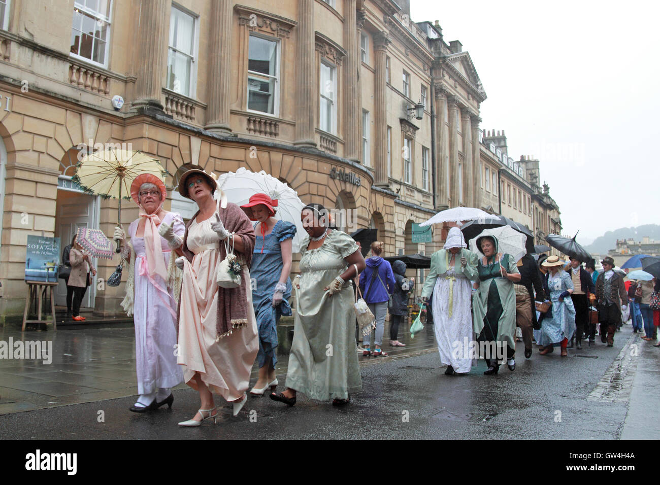 Jane Austen Festival. 9th-18th September 2016. Bath, Somerset, England, UK. Rain failed to dampen the spirits of participants in the Grand Regency Costumed Promenade, Saturday 10th September 2016. Credit:  Ian Bottle/Alamy Live News Stock Photo