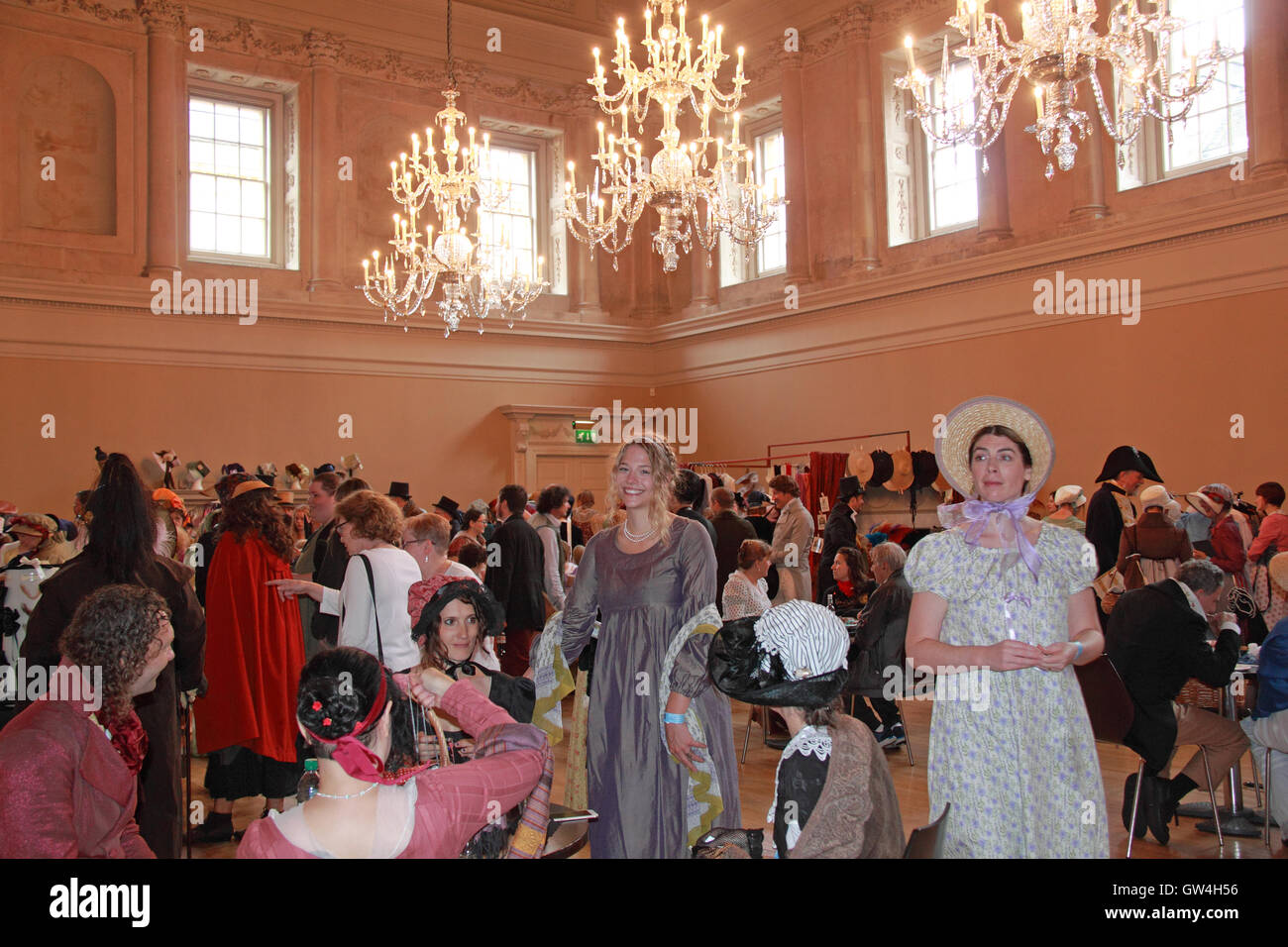 Jane Austen Festival. 9th-18th September 2016. Bath, Somerset, England, UK. Catching up with the news at the Festival Fayre in the Assembly Rooms, Saturday 10th September 2016. Credit:  Ian Bottle/Alamy Live News Stock Photo