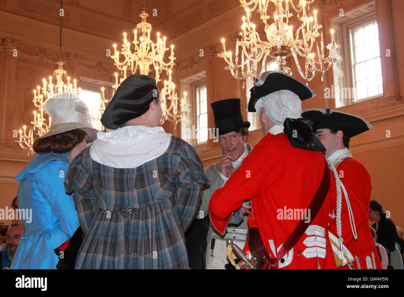 Jane Austen Festival. 9th-18th September 2016. Bath, Somerset, England, UK. Catching up with the news at the Festival Fayre in the Assembly Rooms, Saturday 10th September 2016. Credit:  Ian Bottle/Alamy Live News Stock Photo