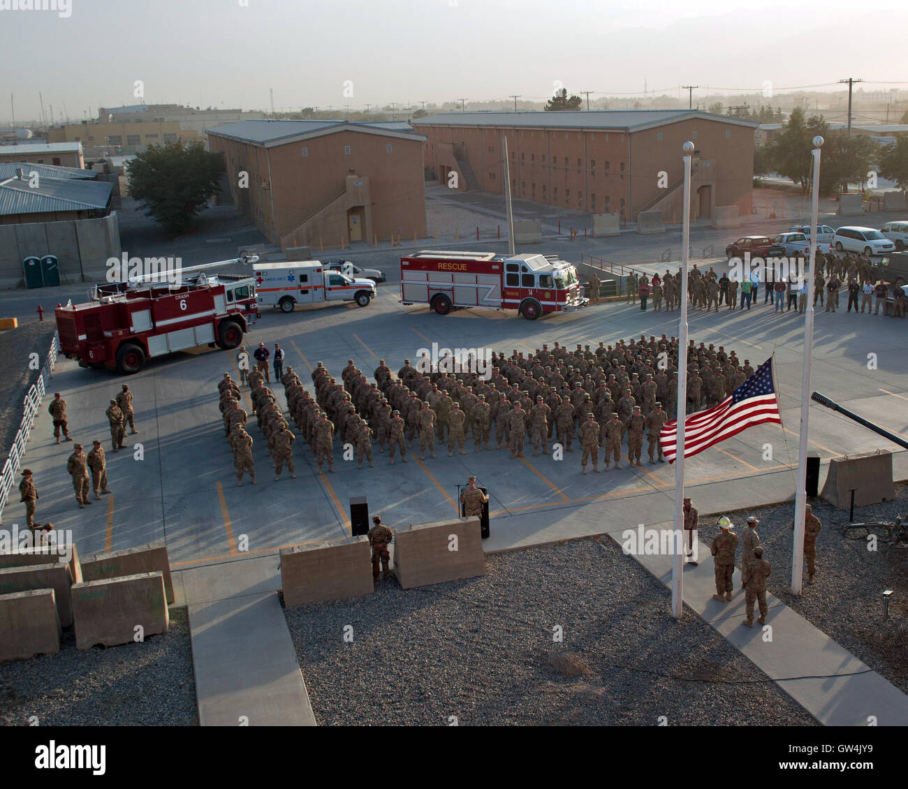 Arlington, Virginia, USA. 11th September, 2016. United States service members gather to honor those killed during the 9/11 terror attacks during a remembrance ceremony commemorating the 15th anniversary at Bagram Airfield September 11, 2016 in Bagram, Afghanistan. Credit:  Planetpix/Alamy Live News Stock Photo