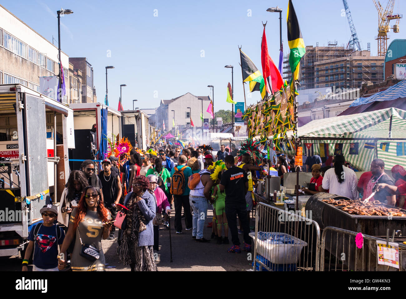 Hackney, London, UK. 11th September 2016. People walking around food stalls and sound systems during the Hackney Carnival 2016 in Ridley Road. Credit:  Nicola Ferrari/Alamy Live News. Stock Photo