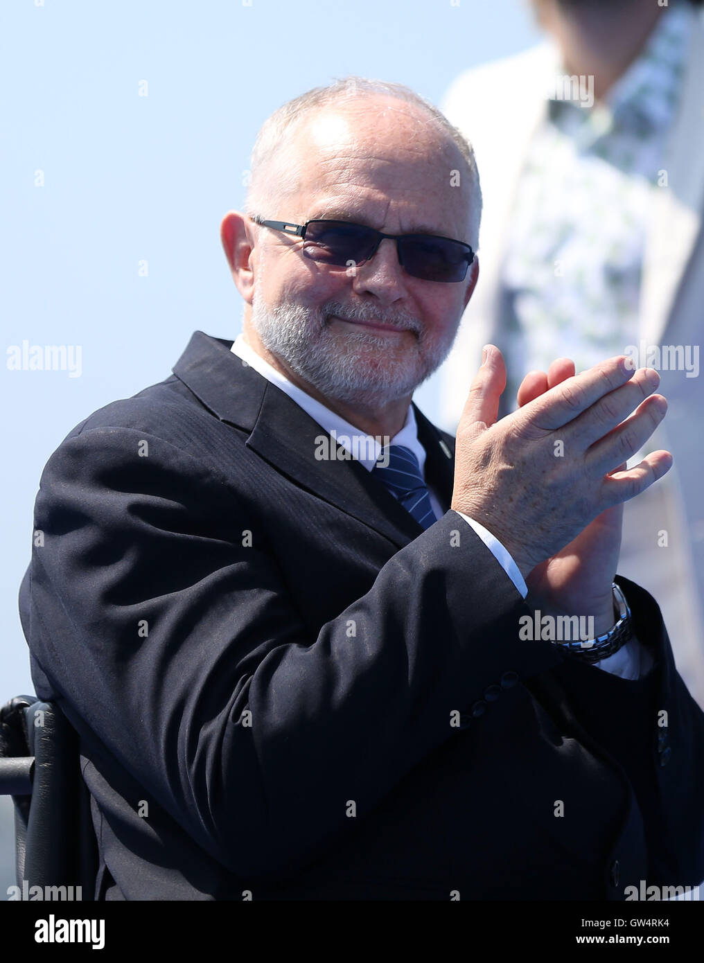 Rio De Janeiro, Brazil. 11th Sep, 2016. Sir Philip Craven, president of the International Paralympic Committee, claps hands during the awarding ceremony of the LTA Mixed Coxed Four final of rowing event at the 2016 Rio Paralympic Games in Rio de Janeiro, Brazil, Sept. 11, 2016. Credit:  Li Ming/Xinhua/Alamy Live News Stock Photo