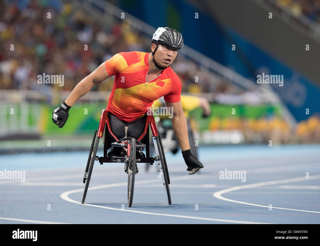 China's Chengming Liu crosses finish line to win his preliminary heat ...
