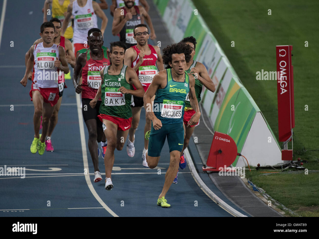 Visually impaired runners compete in the 1,500-meter T13 race at the 2016 Rio Paralympic Games. Stock Photo