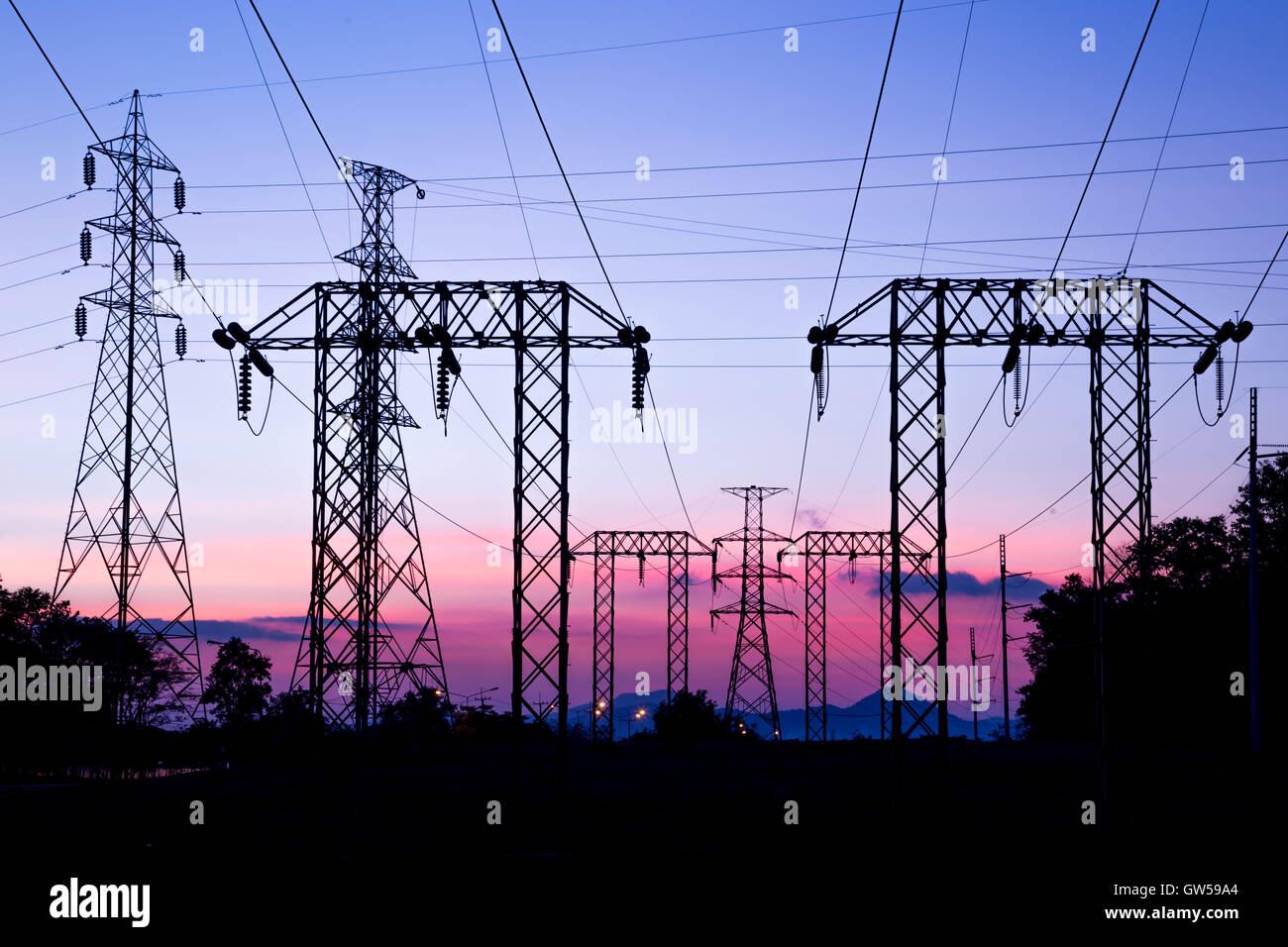 High voltage post and sky in twilight time Stock Photo - Alamy