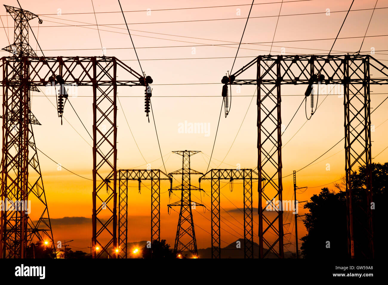 High voltage post and sky in twilight time Stock Photo - Alamy
