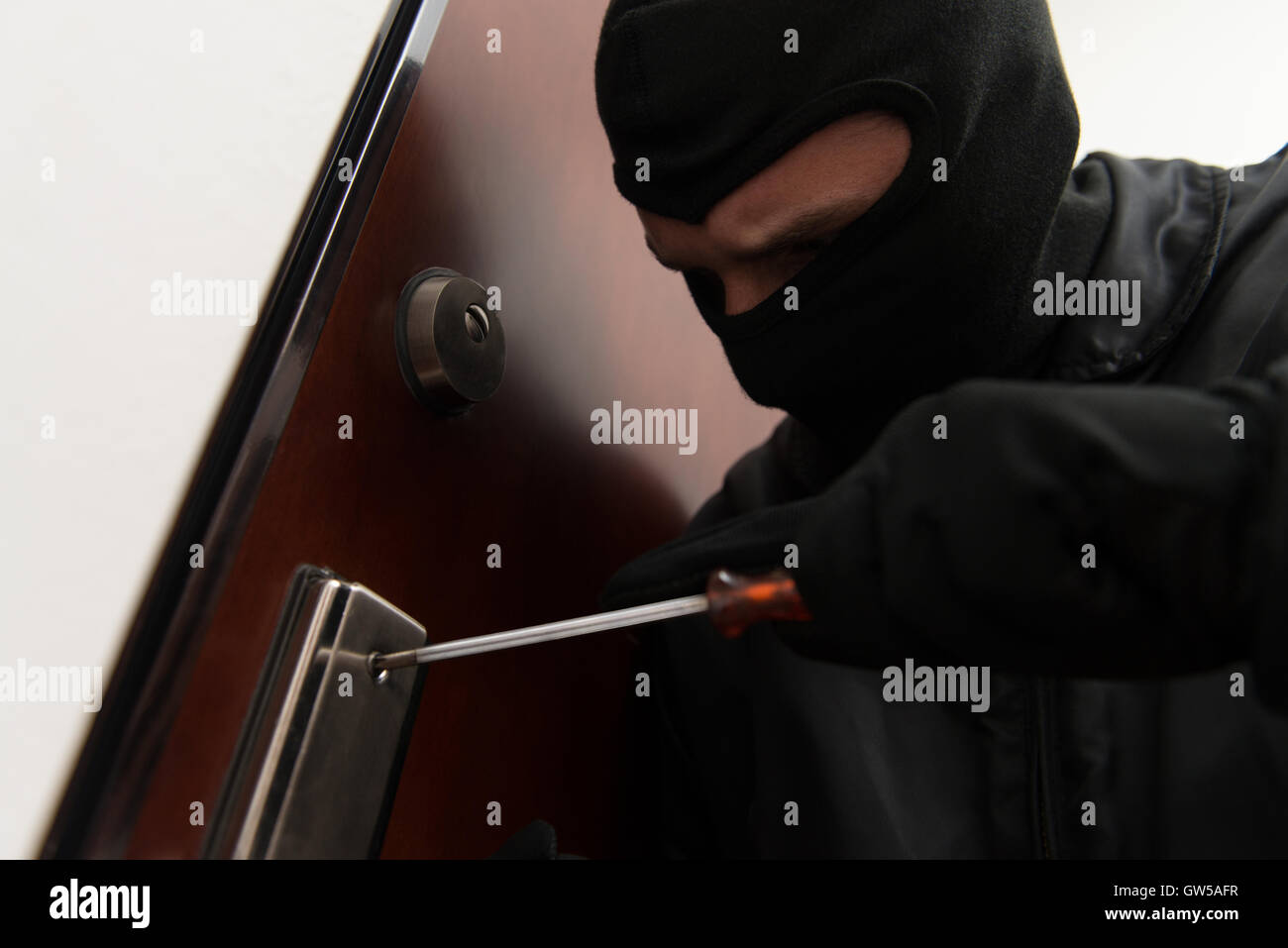 Burglar breaking in hires stock photography and images Alamy