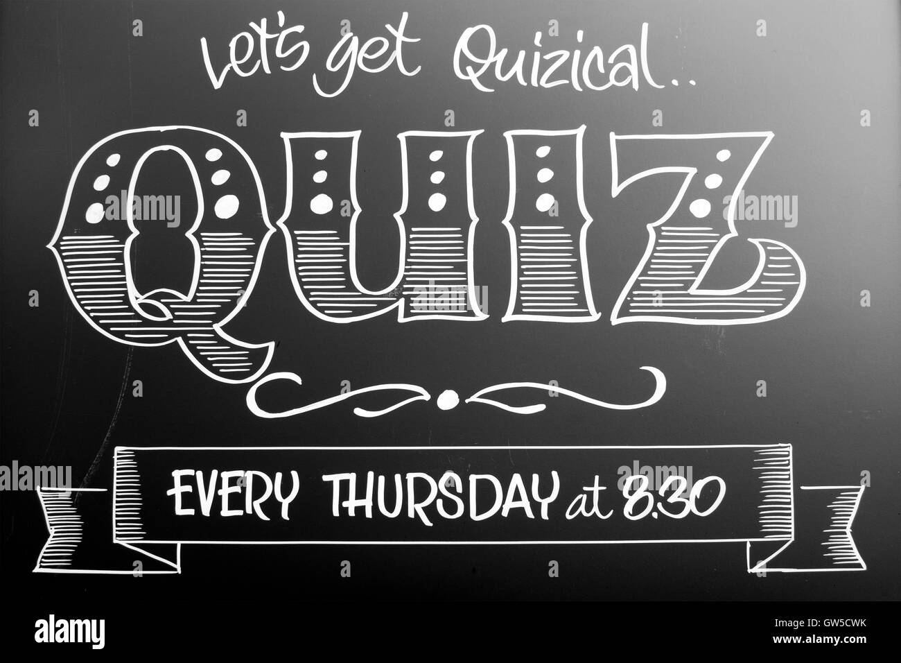 Pub Quiz sign in black and white. Lets get Quizical. Stock Photo