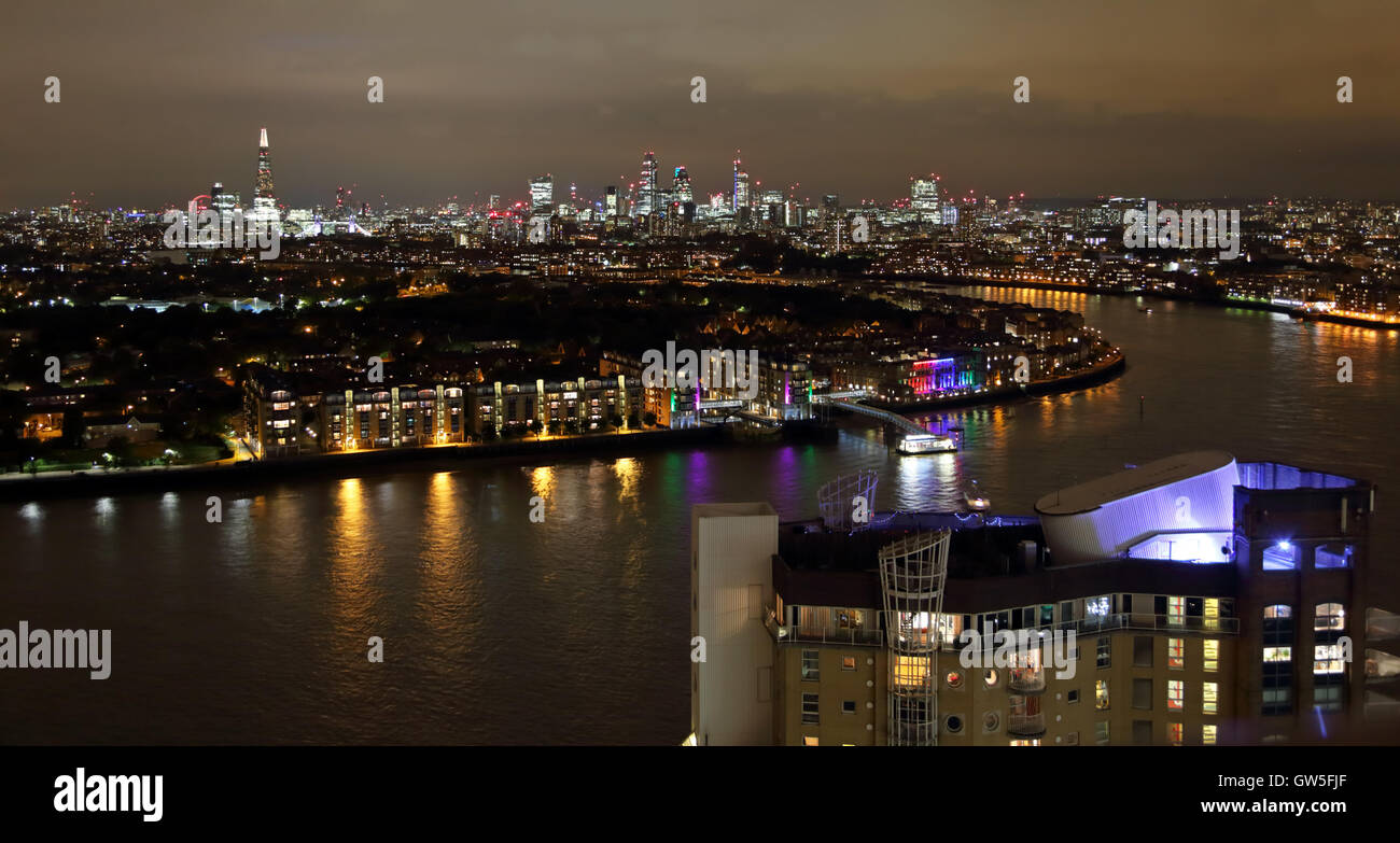 Night view of the River Thames with Cascades Tower in the foreground from Marsh Wall, Canary Wharf, London, UK, E14 Stock Photo