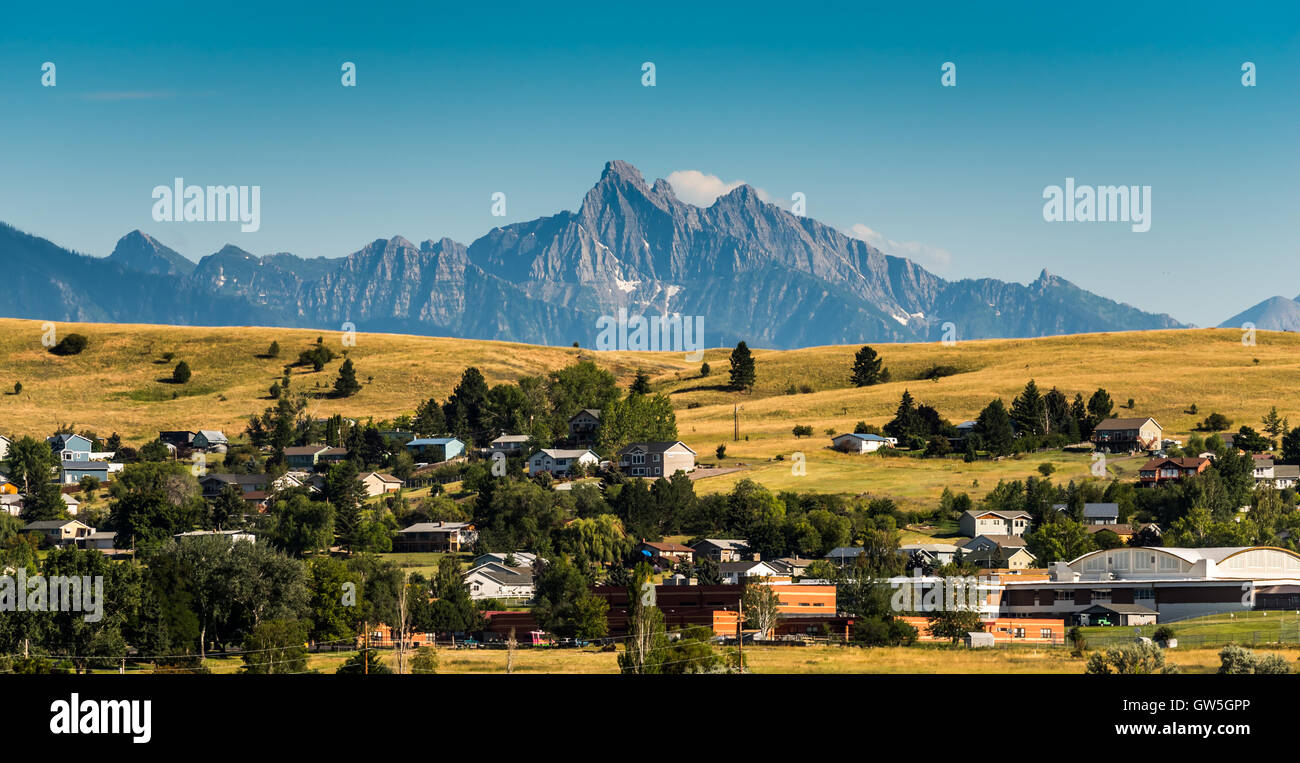 Mission mountains behind Polson High School Stock Photo - Alamy