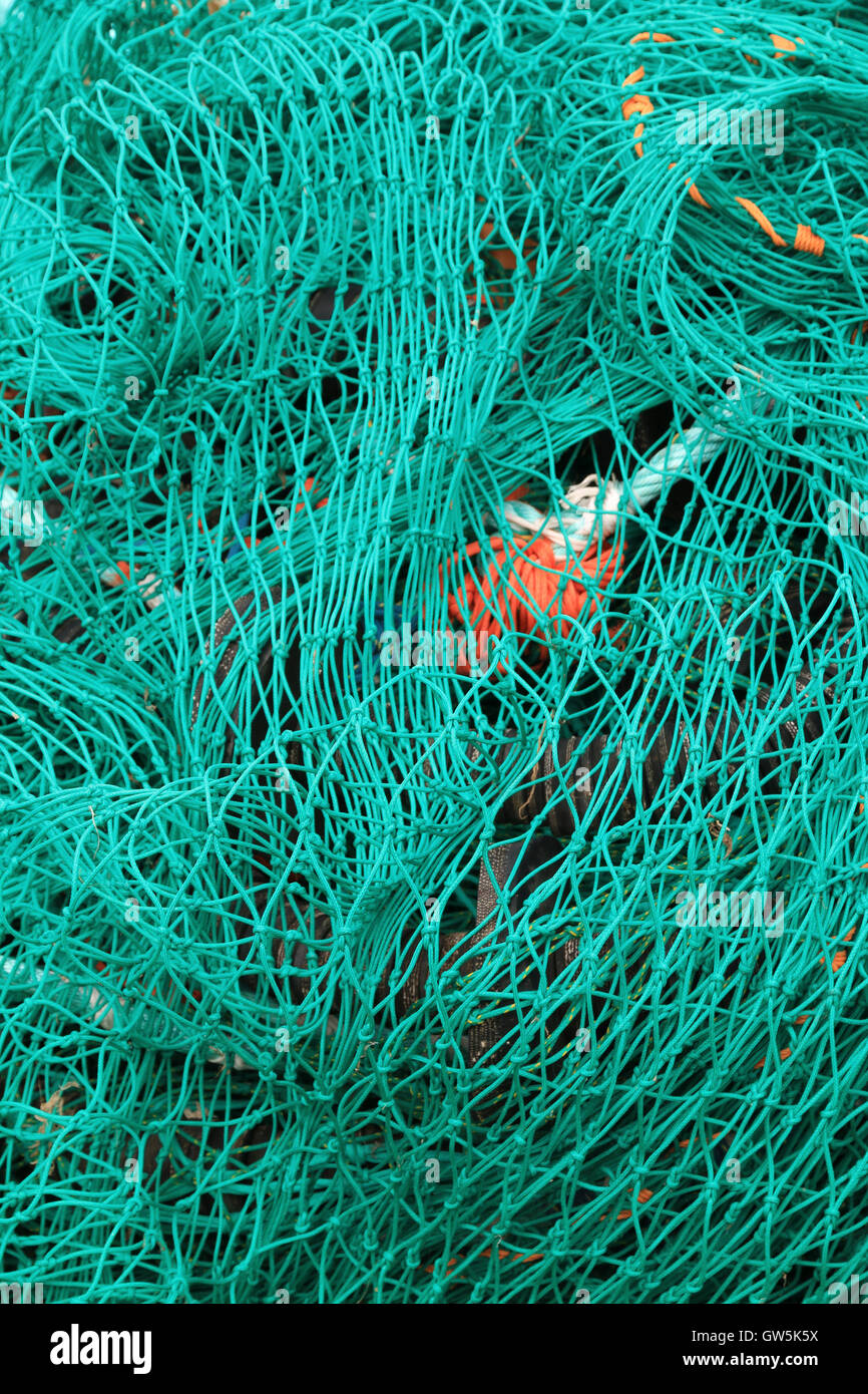 Green mesh fishing net Stock Photo Alamy