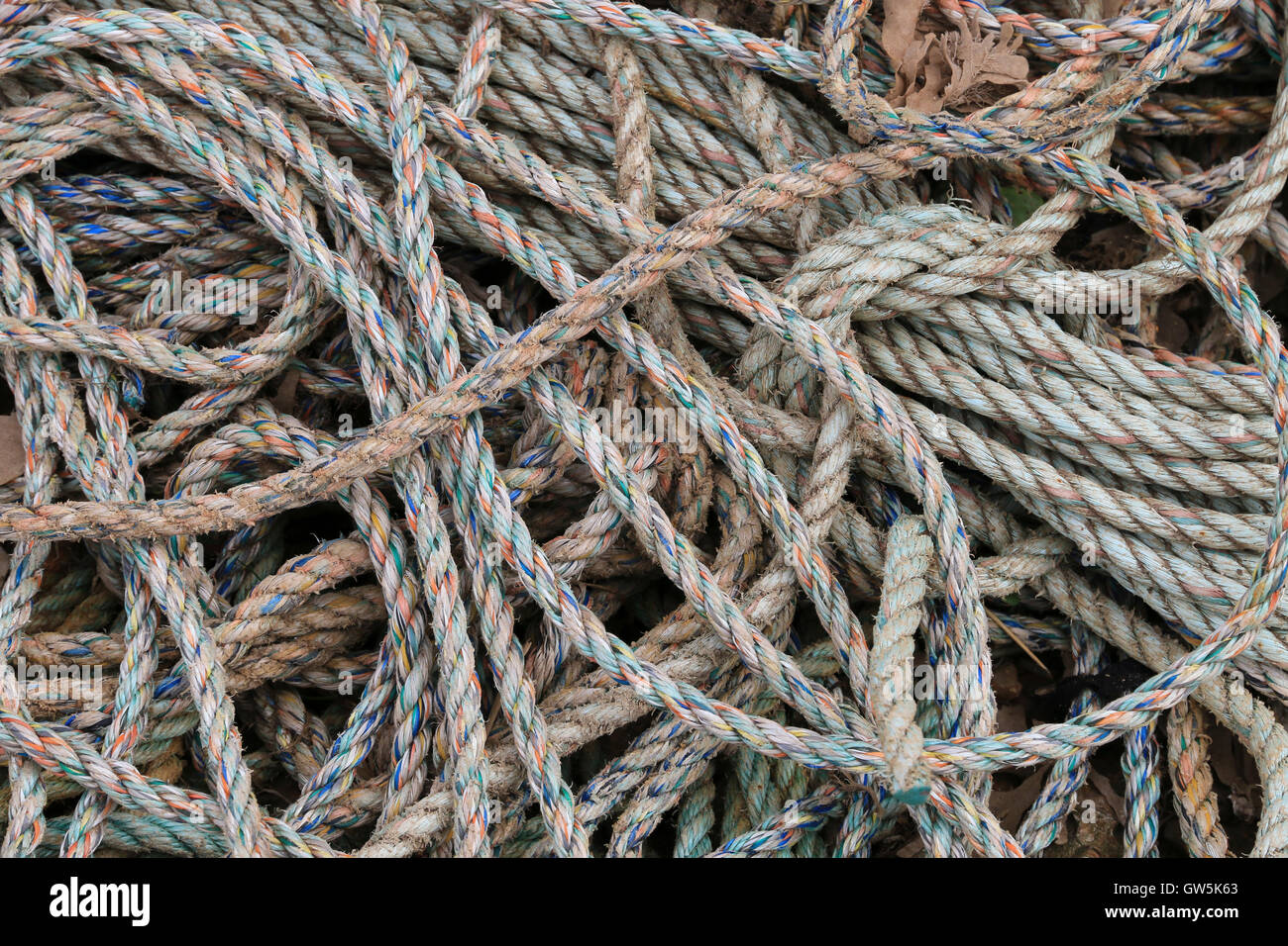 multi-coloured rope on quayside Stock Photo