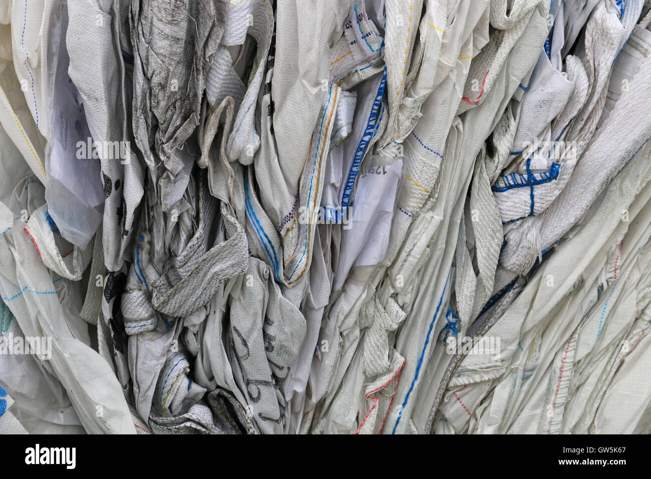 section of tightly folded empty storage bags Stock Photo