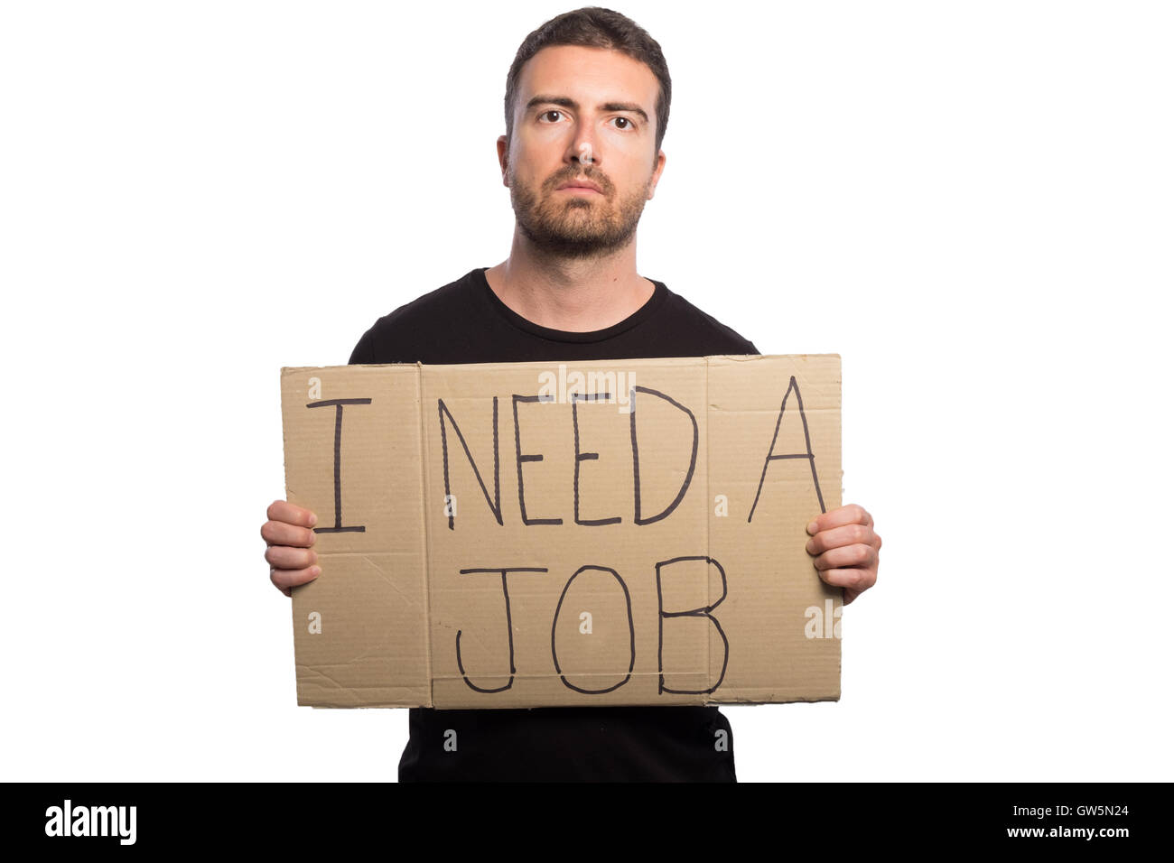 Unemployed man holding a cardboard isolated on white background Stock Photo