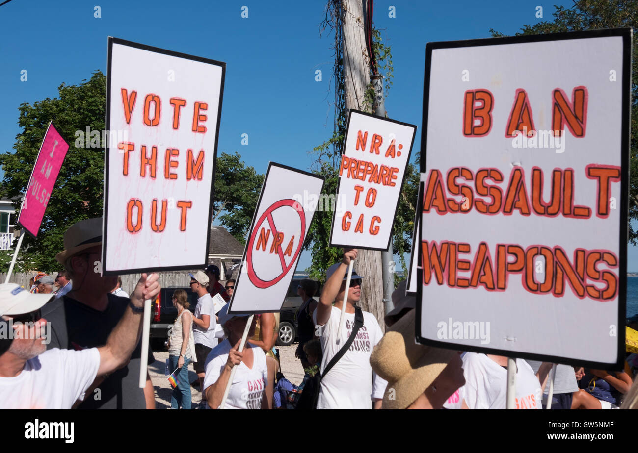 Protesters against gun violence demonstrate with signs and placards Stock Photo