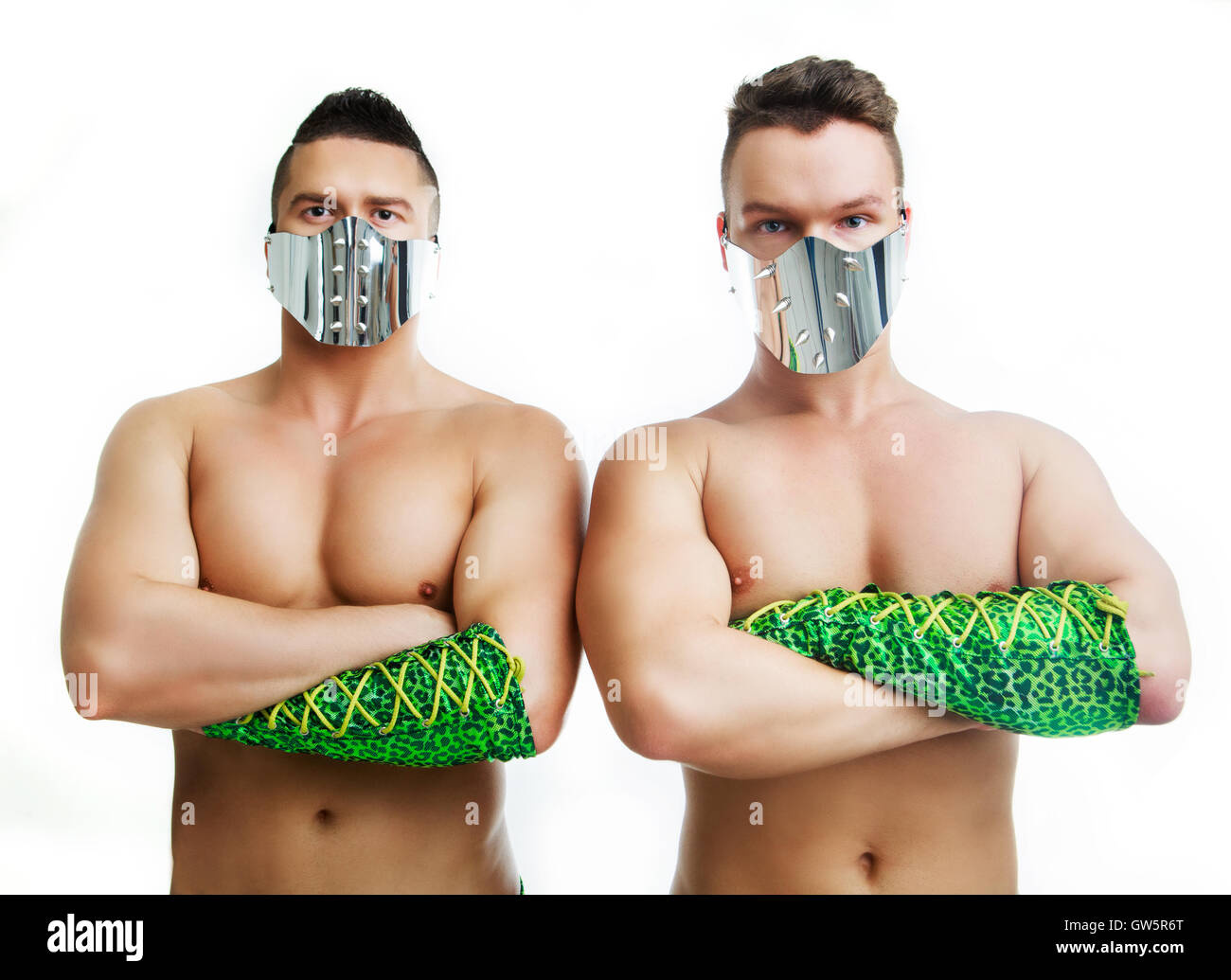 two young attractive men dancing striptease isolated against white  background Stock Photo - Alamy