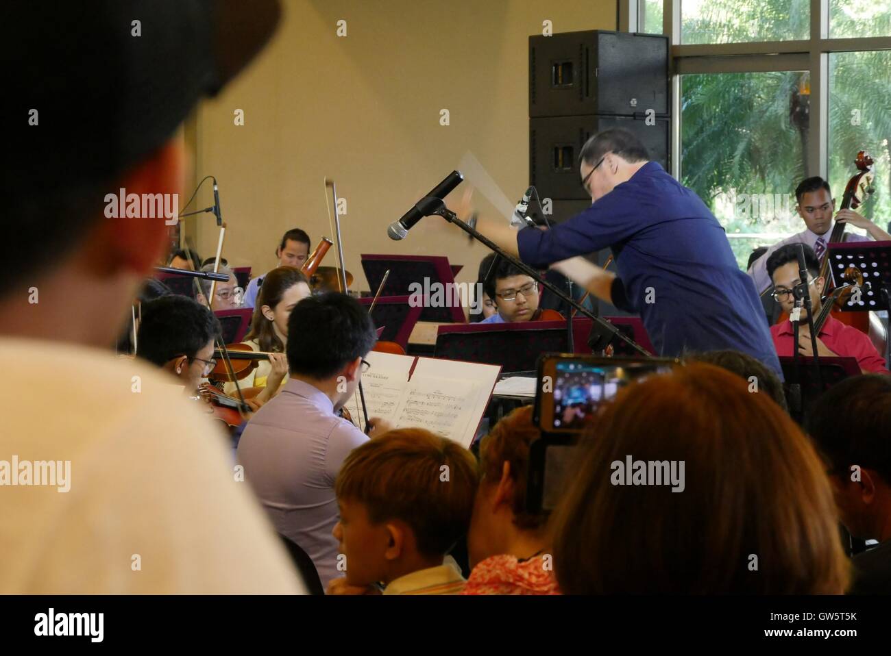 Quezon, Philippines. 11th Sep, 2016. Conducted by Prof. Arturo Molina during the celebration of Grandparents day, the Manila Symphony Orchestra will perform timeless work of German composer Johann Sebastian Bach along with orchestral renditions of the hits of John, Paul, George, and Ringo a.k.a. The Beatles in this rare musical mash-up. This is a free admission most specially for senior citizens which is performed at the cinema lob of Trinoma. © George Buid/Pacific Press/Alamy Live News Stock Photo