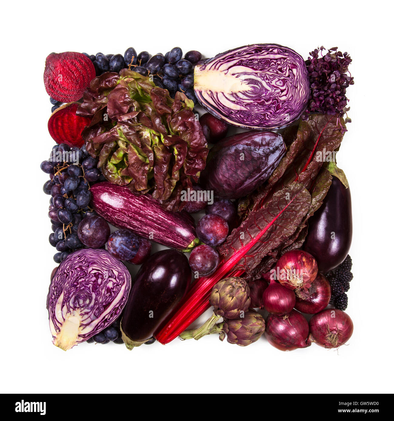 Square of blue and purple fruits and vegetables isolated on a white background Stock Photo