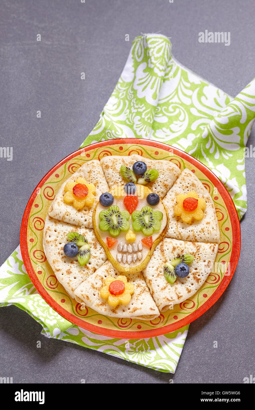 Fruity Sugar scull with crepes for Halloween Stock Photo