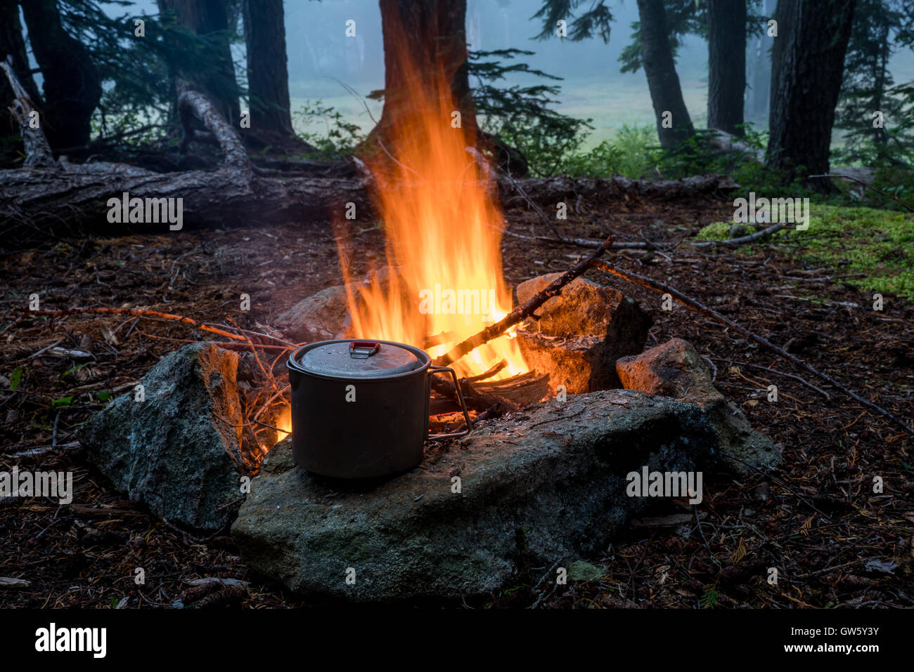 Boiling water pot campfire hires stock photography and images Alamy