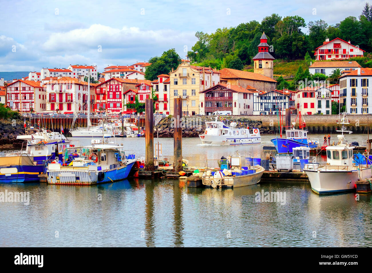 Traditional half-timbered basque houses in port of St Jean de Luz, on the atlantic coast of France Stock Photo