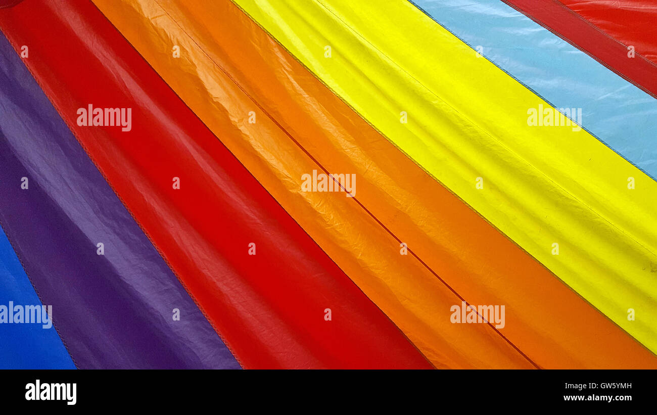 bold rainbow stripes on sailboat spinnaker Stock Photo Alamy