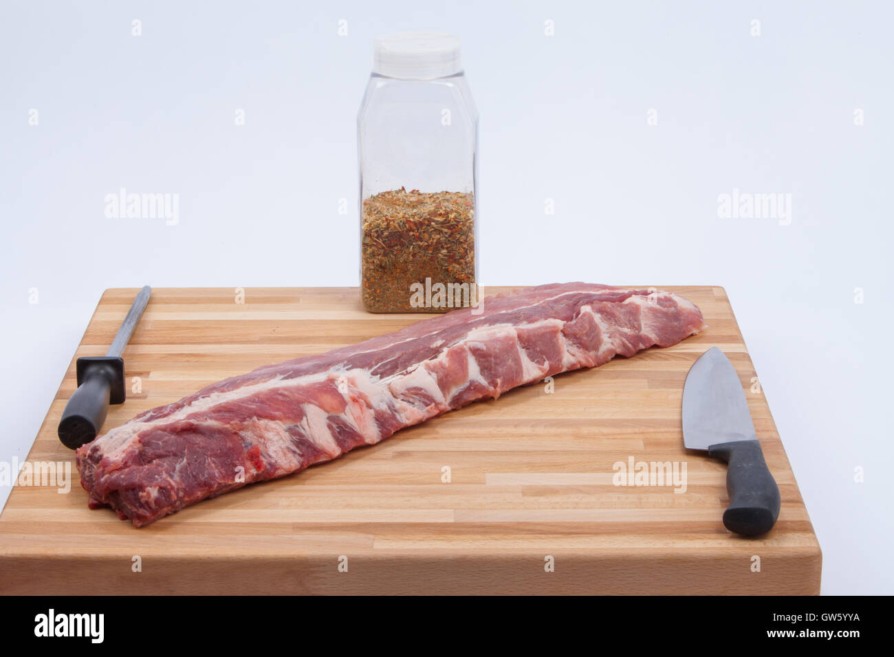Raw, uncooked ,baby back ribs, board,  meat, pork dinner,brown,healthy, table, BBQ Stock Photo