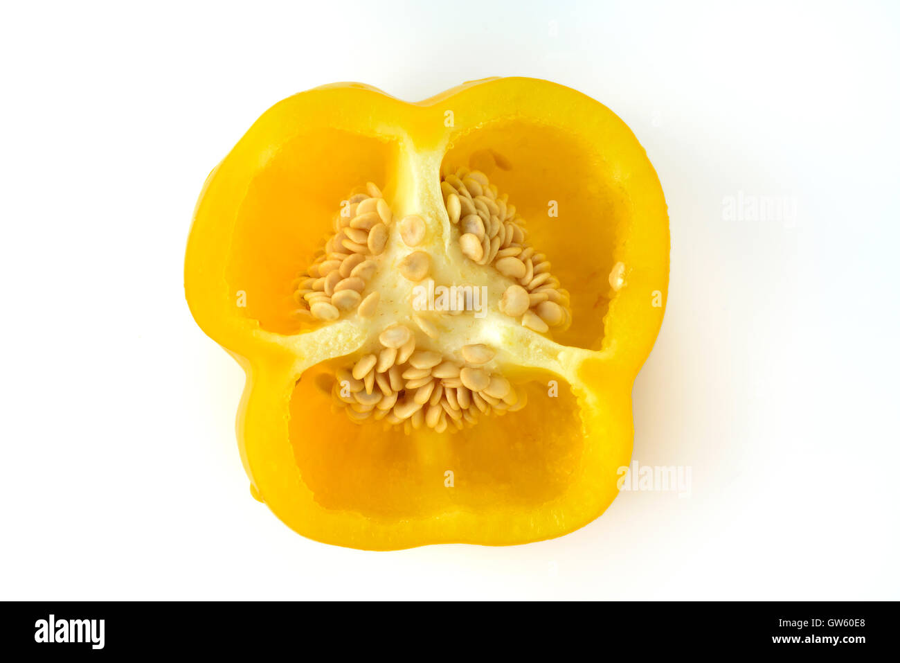 Cross Section of Yellow Bell Pepper Shot from Directly Above Stock Photo