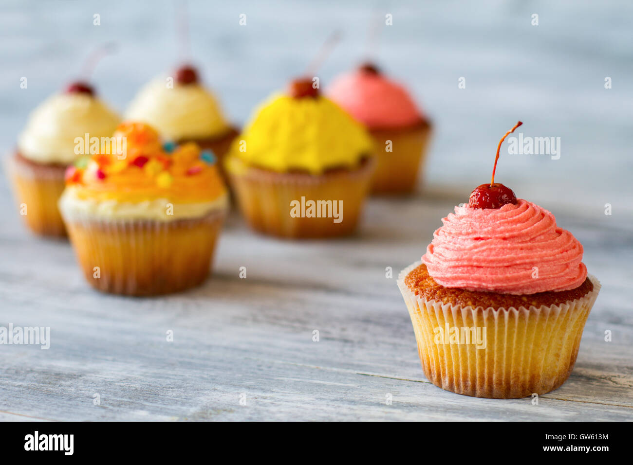 Cupcake with pink frosting. Stock Photo