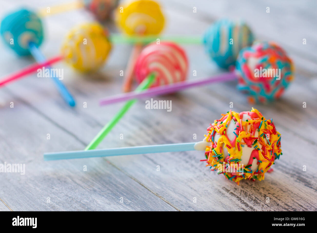 Bright candy on a stick Stock Photo Alamy