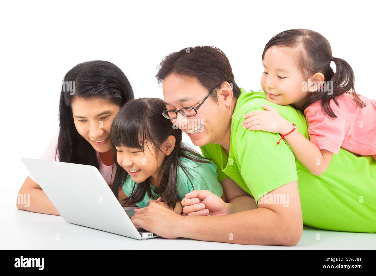happy family with computer Stock Photo - Alamy image.