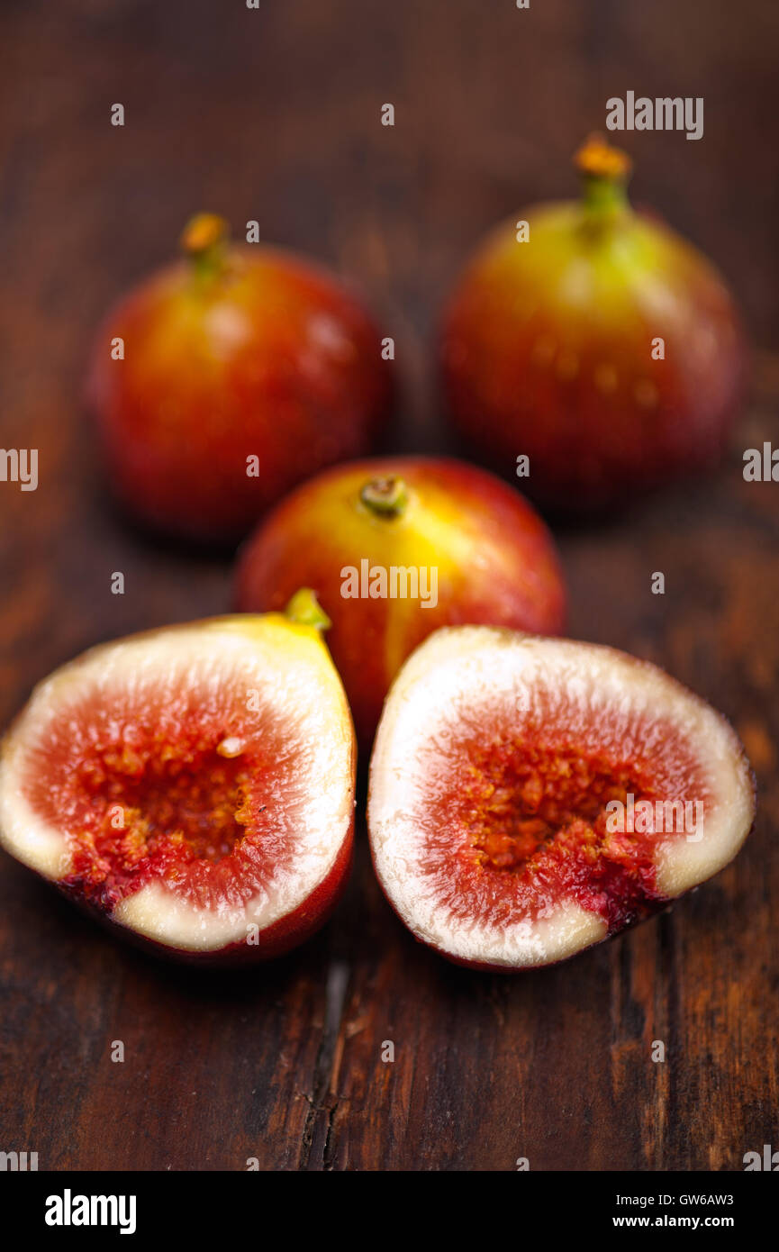 Over Ripped Figs fresh figs over old wood Stock Photo - Alamy