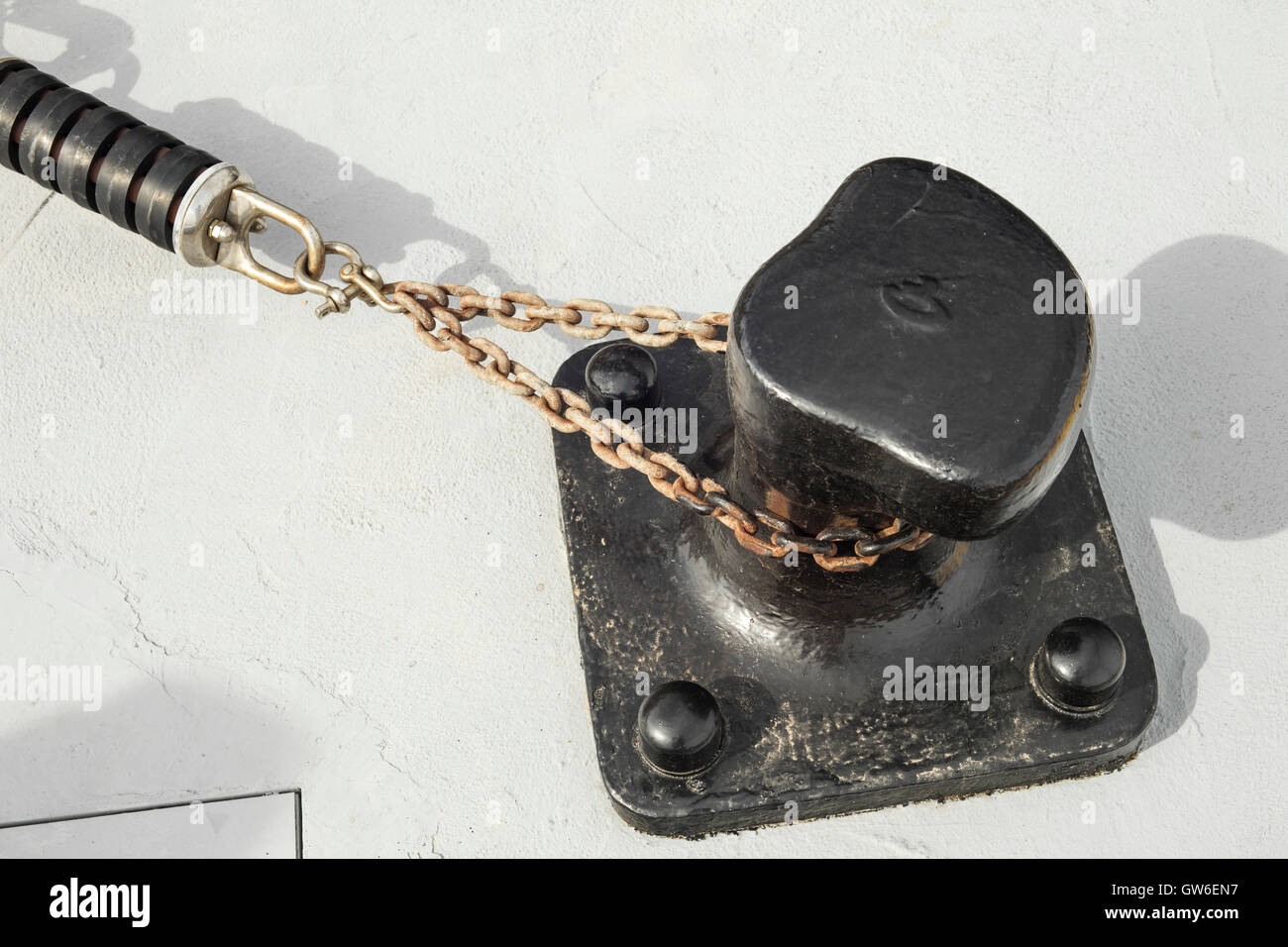 Detail of iron pole for mooring at port Stock Photo Alamy