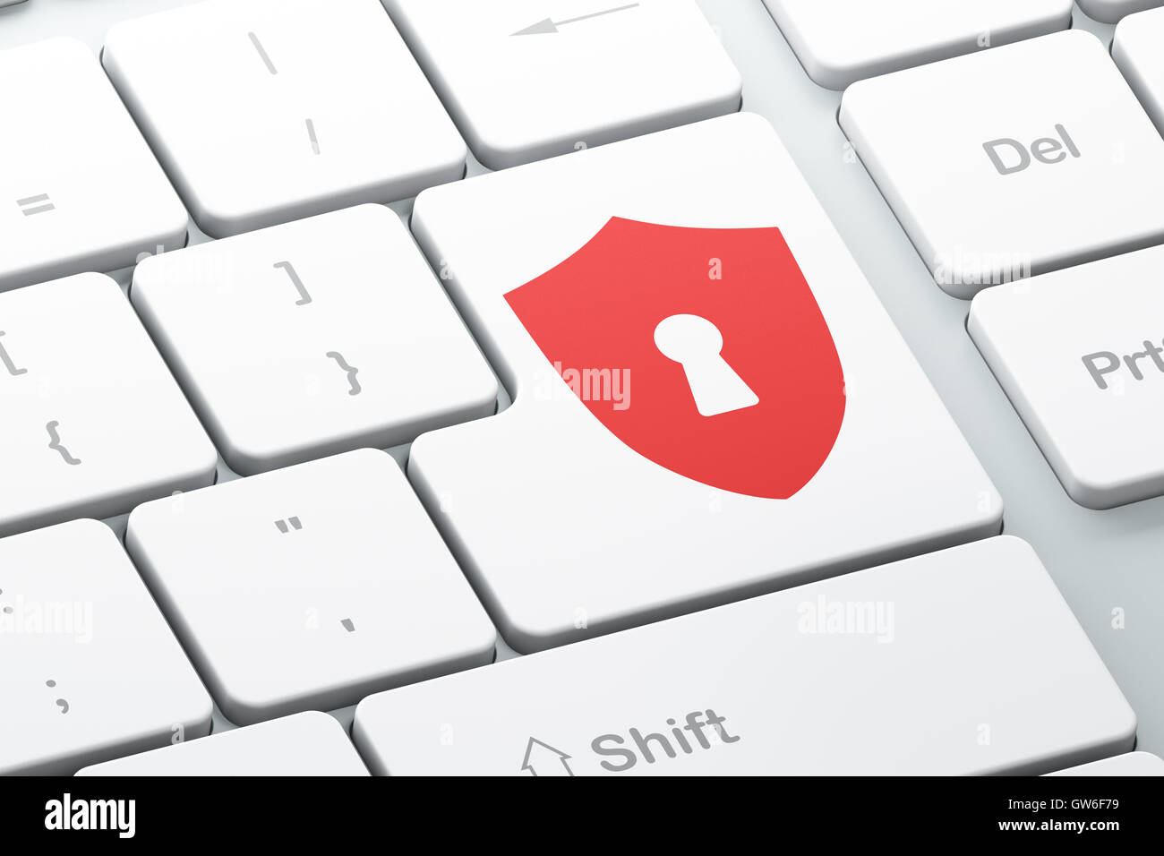 Protection concept: Shield With Keyhole on computer keyboard bac Stock Photo