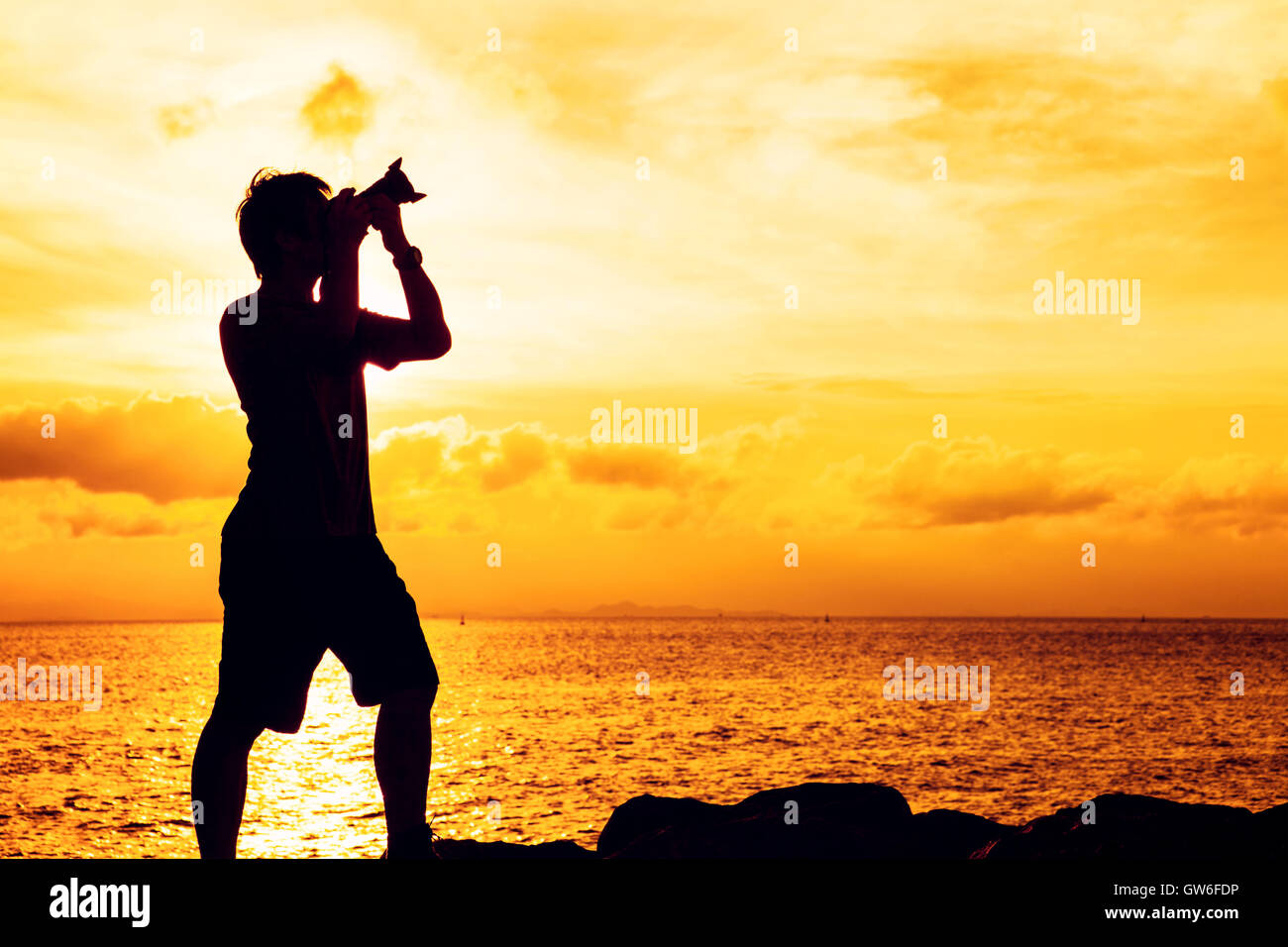 Camera on tripod beach sunset hi-res stock photography and images - Alamy