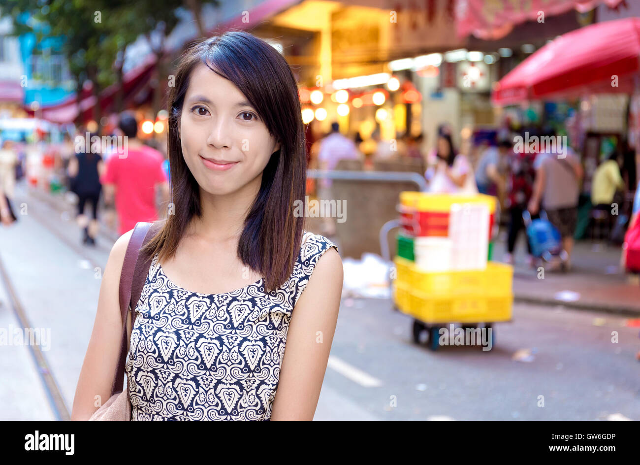 Hong Kong woman in wet market Stock Photo - Alamy