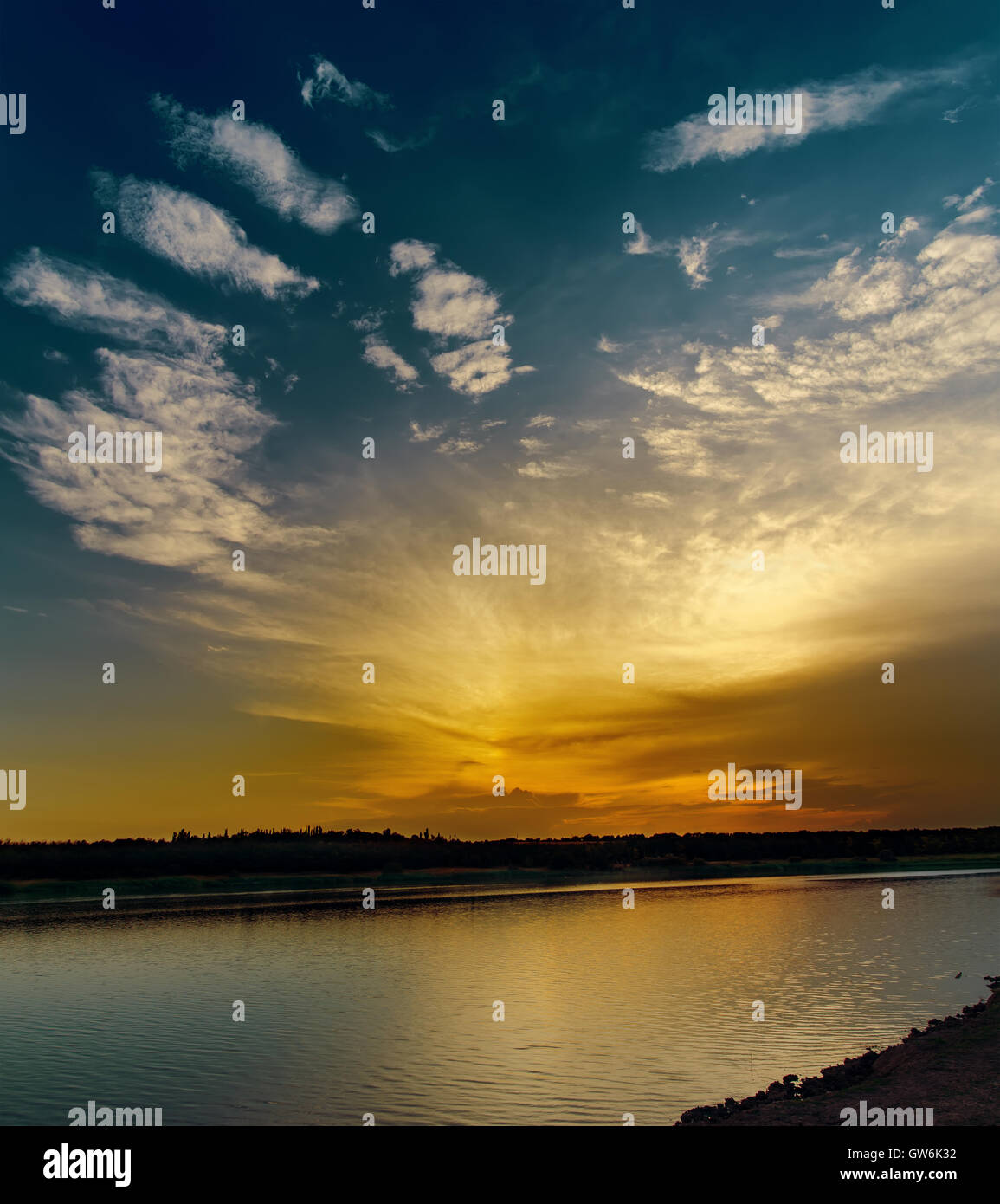 good dramatic sunset over river Stock Photo - Alamy