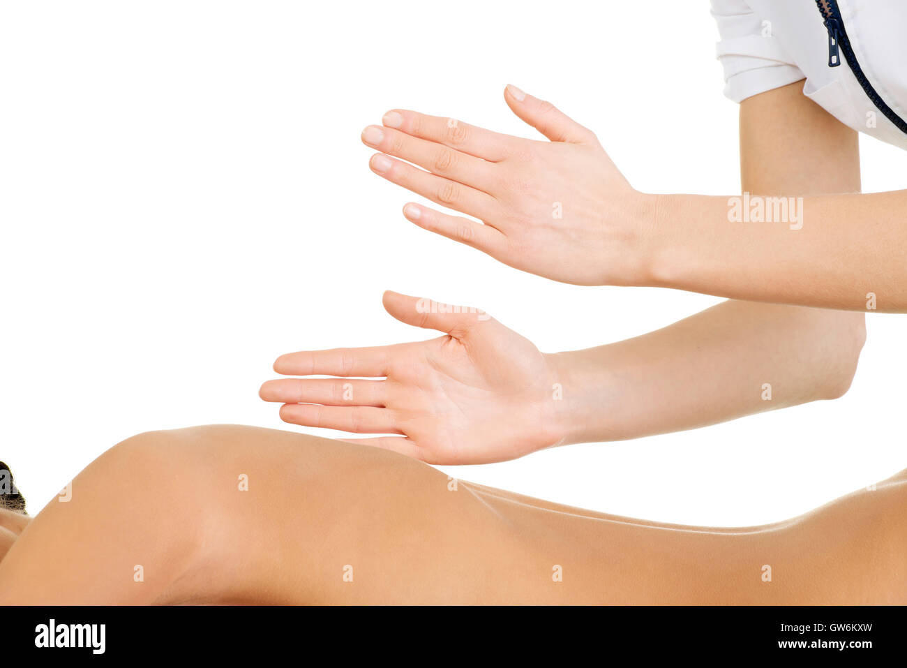 Preaty young woman relaxing beeing massaged Stock Photo