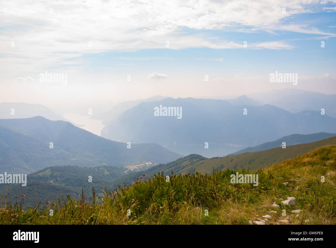 Landscape from the top of a mountain with lake in the background Stock Photo
