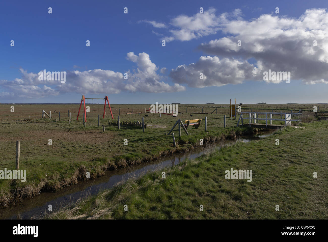 The playground on the tiny islet of Langeness in the mud flats, North Sea, Schleswig-Holstein, Germany Stock Photo
