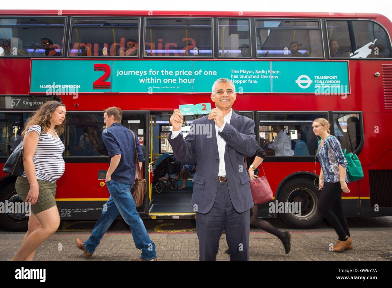 Mayor of London Sadiq Khan launches the new 'bus hopper' bus fare, which allows passengers to make two bus journeys in a one-hour window for one fare, in Tooting, south London. Stock Photo