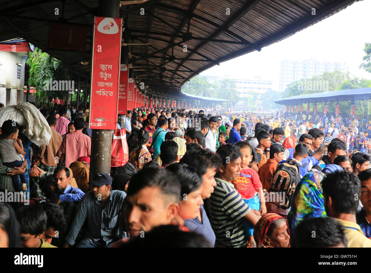 Dhaka, Bangladesh. 12 September, 2016: People wait at the Airport Railway station for a train to reach village home to spend Eid-ul-Azha holidays. Stock Photo