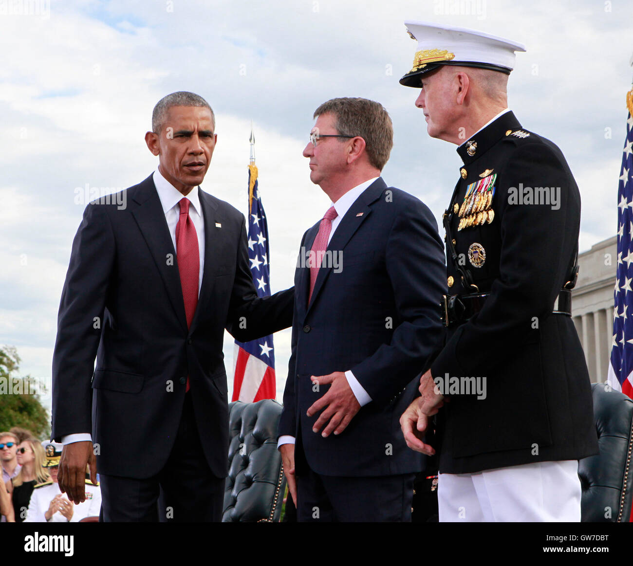 WASHINGTON DC - SEPTEMBER 11: United States President Barack Obama, left, with US Secretary of Defense Ash Carter, center, and US Marine Corps General Joseph F. Dunford Jr., Chairman of the Joint Chiefs of Staff, right, at the Pentagon Memorial in Washington, DC during an observance ceremony to commemorate the 15th anniversary of the 9/11 terrorist attacks, Sunday, September 11, 2016. Credit: Dennis Brack / Pool via CNP/MediaPunch Stock Photo