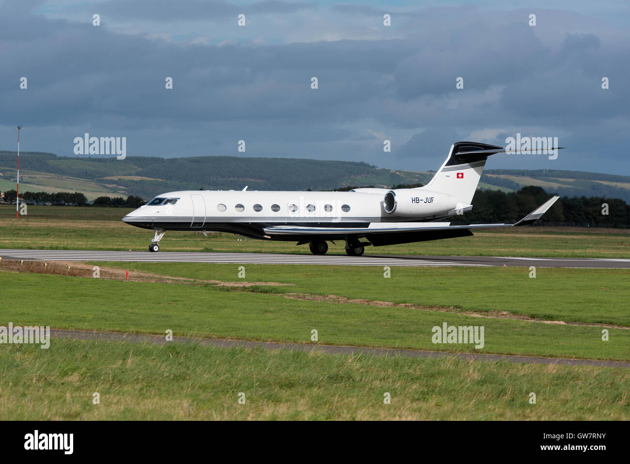 Swiss twin-engine business jet HB-JUF airplane produced by Gulfstream Aerospace arriving at Inverness Scotland.  SCO 11,240. Stock Photo