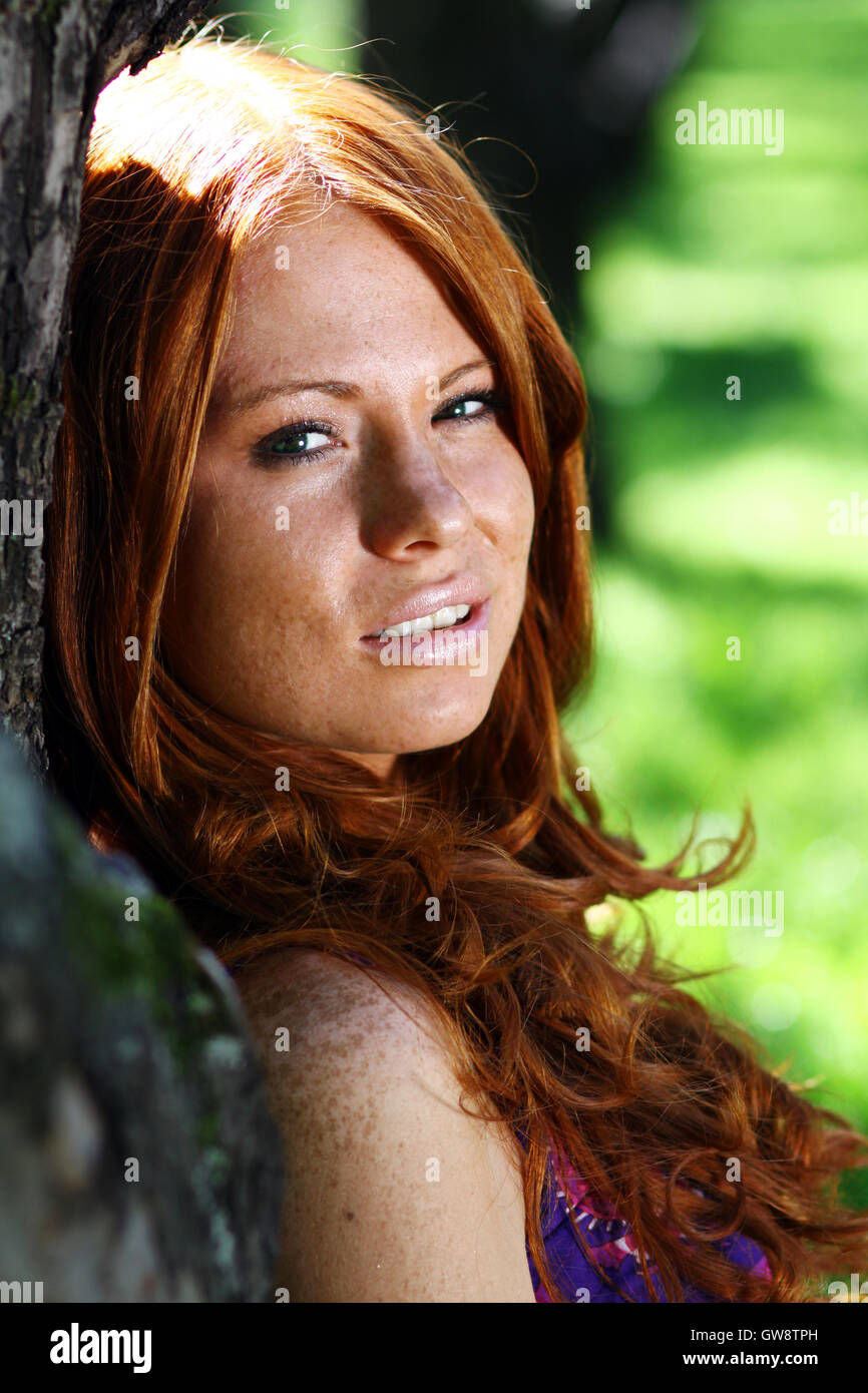 Portrait of red-haired beautiful young woman Stock Photo - Alamy