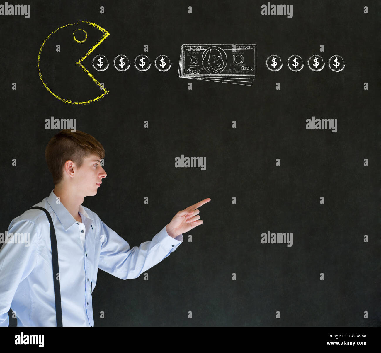 Business man with pacman on blackboard Stock Photo