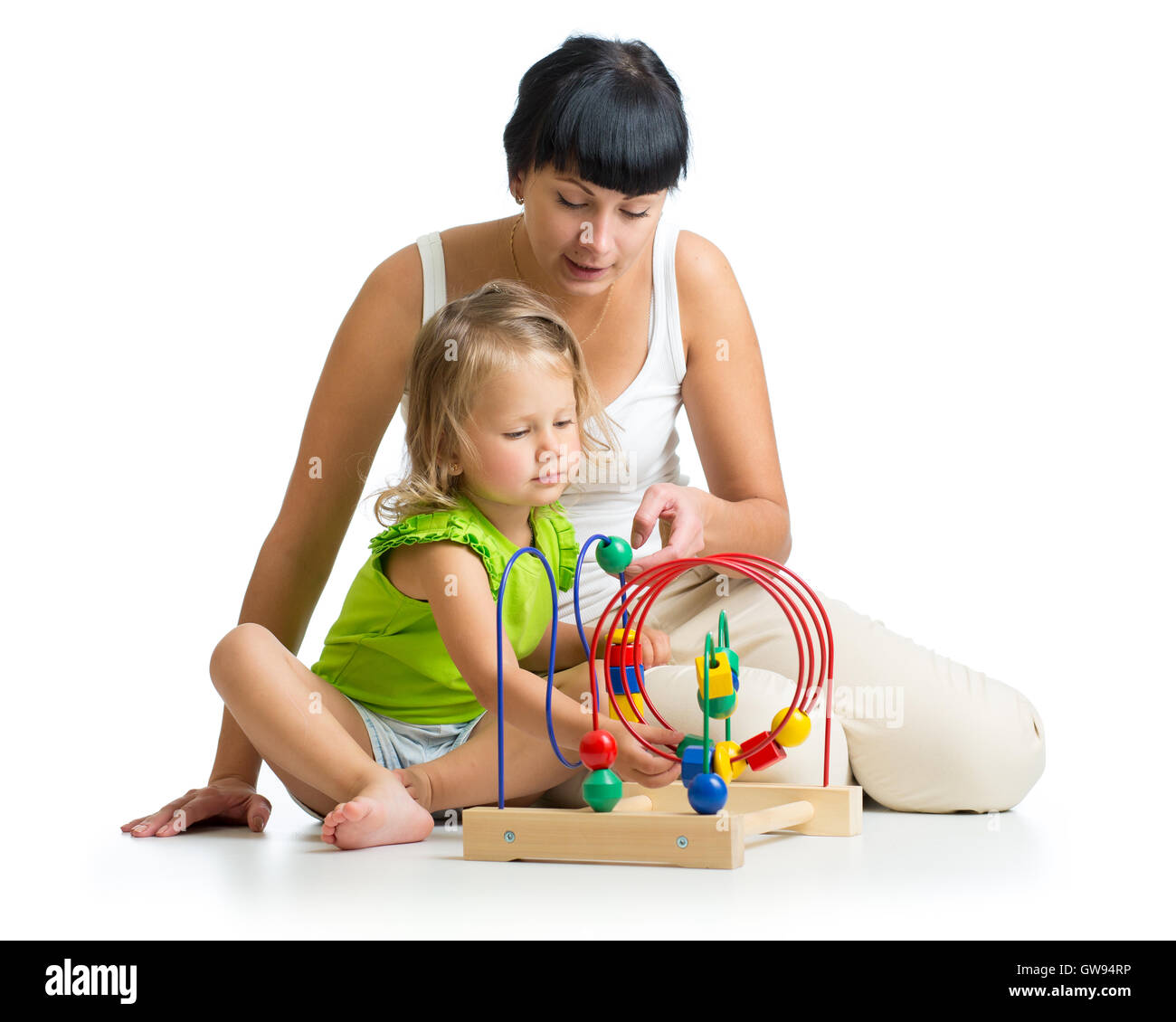 kid and mother playing with educational toy Stock Photo